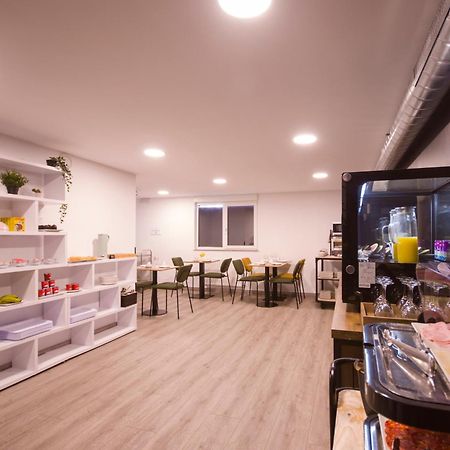 U-Hotel Dario لوغو المظهر الخارجي الصورة