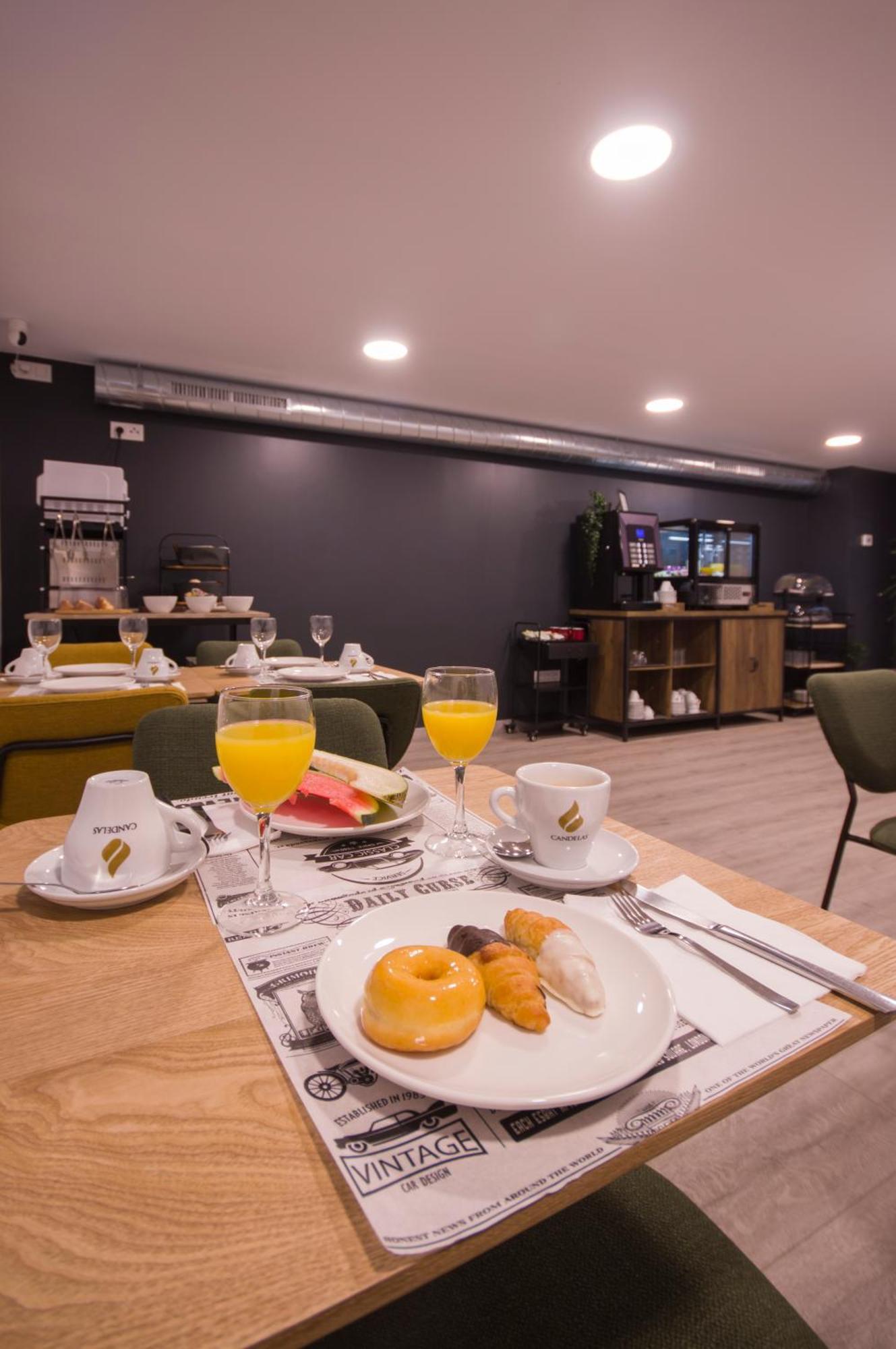 U-Hotel Dario لوغو المظهر الخارجي الصورة