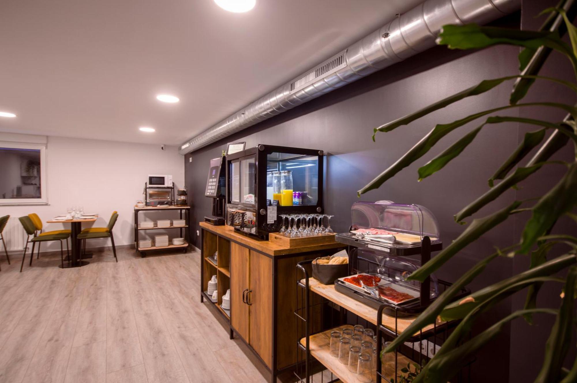 U-Hotel Dario لوغو المظهر الخارجي الصورة